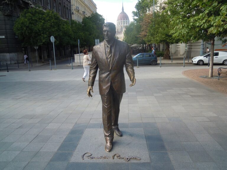 Bronze statue of Ronald Reagan walking across Liberty Square in Budapest